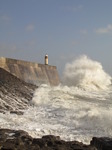 SX10155 Spray of wave reflected from Porthcawl point at lighthouse.jpg